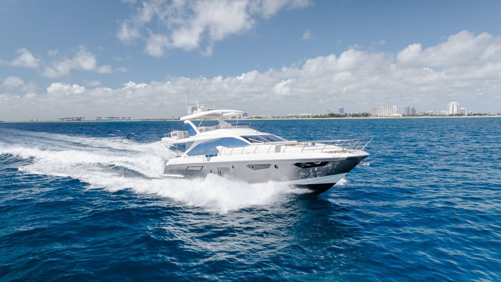 Azimut 75 flybridge yacht cruising off the Florida coast