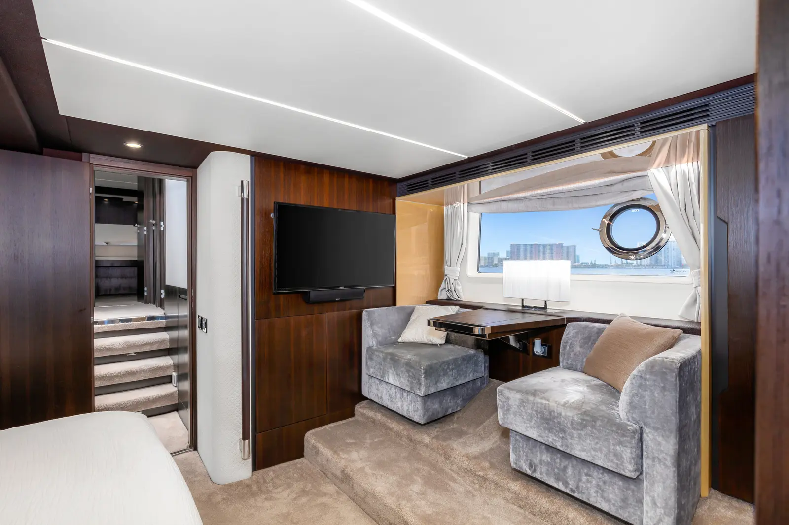 Azimut 68 "Le Grand Bleu" master suite sitting area with TV