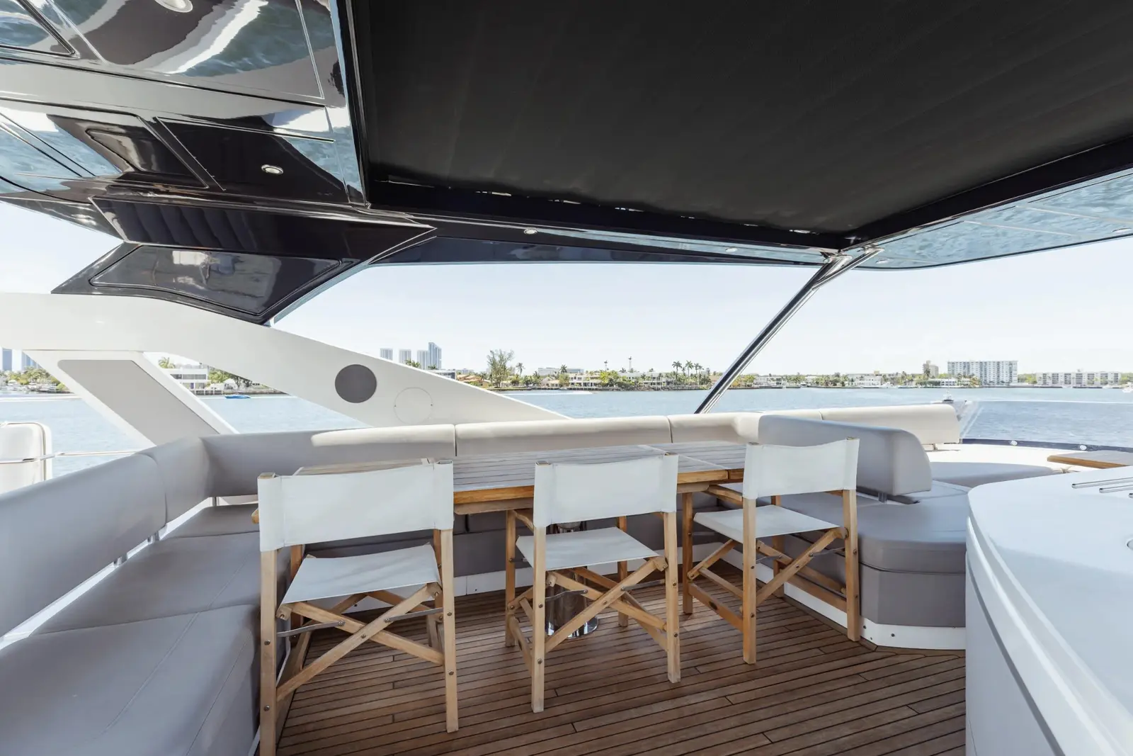 Sunseeker 80 flybridge dining under the hardtop