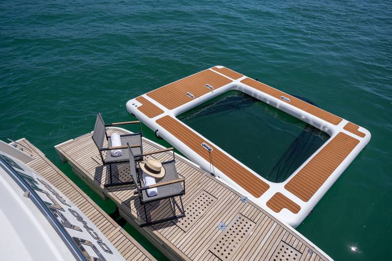 Prestige 65 "No Plans" floating pool by the swim platform