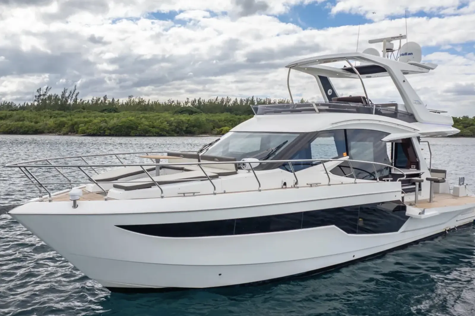 Galeon 53 at anchor near the shoreline