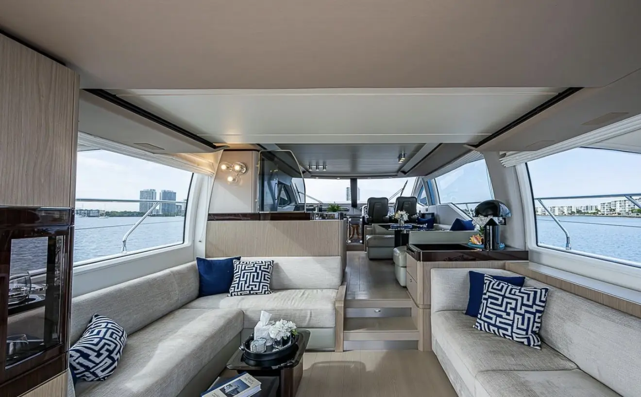 Azimut 70 "ALEV" salon with white sofas and blue cushions
