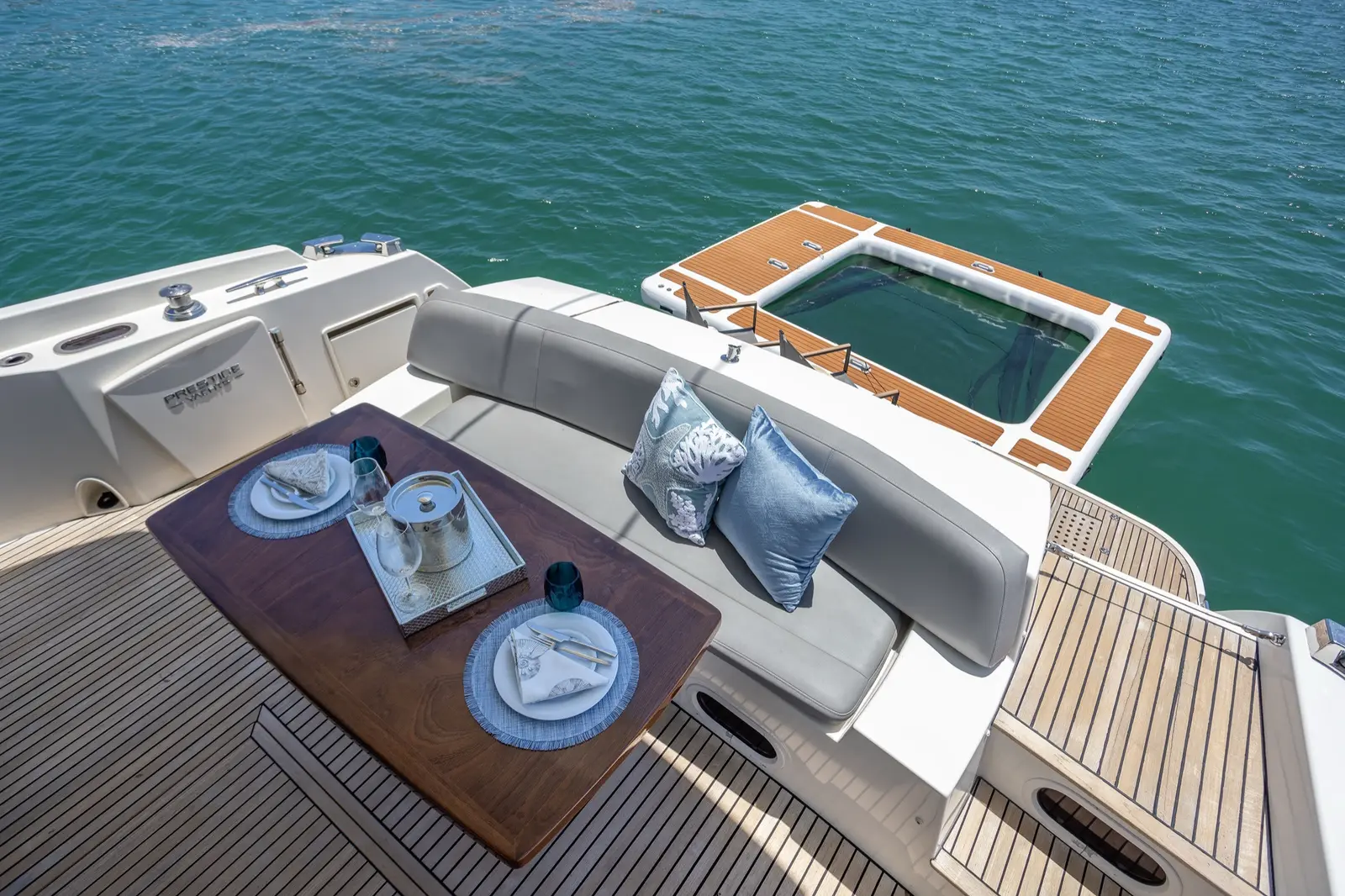 Prestige 65 "No Plans" flybridge dining table