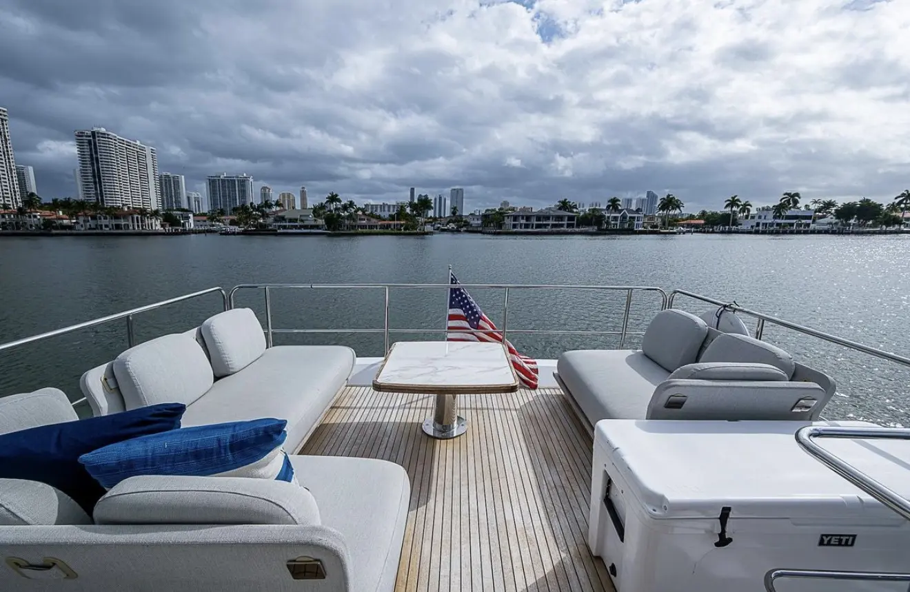 Azimut 70 "ALEV" aft deck lounge with the skyline behind