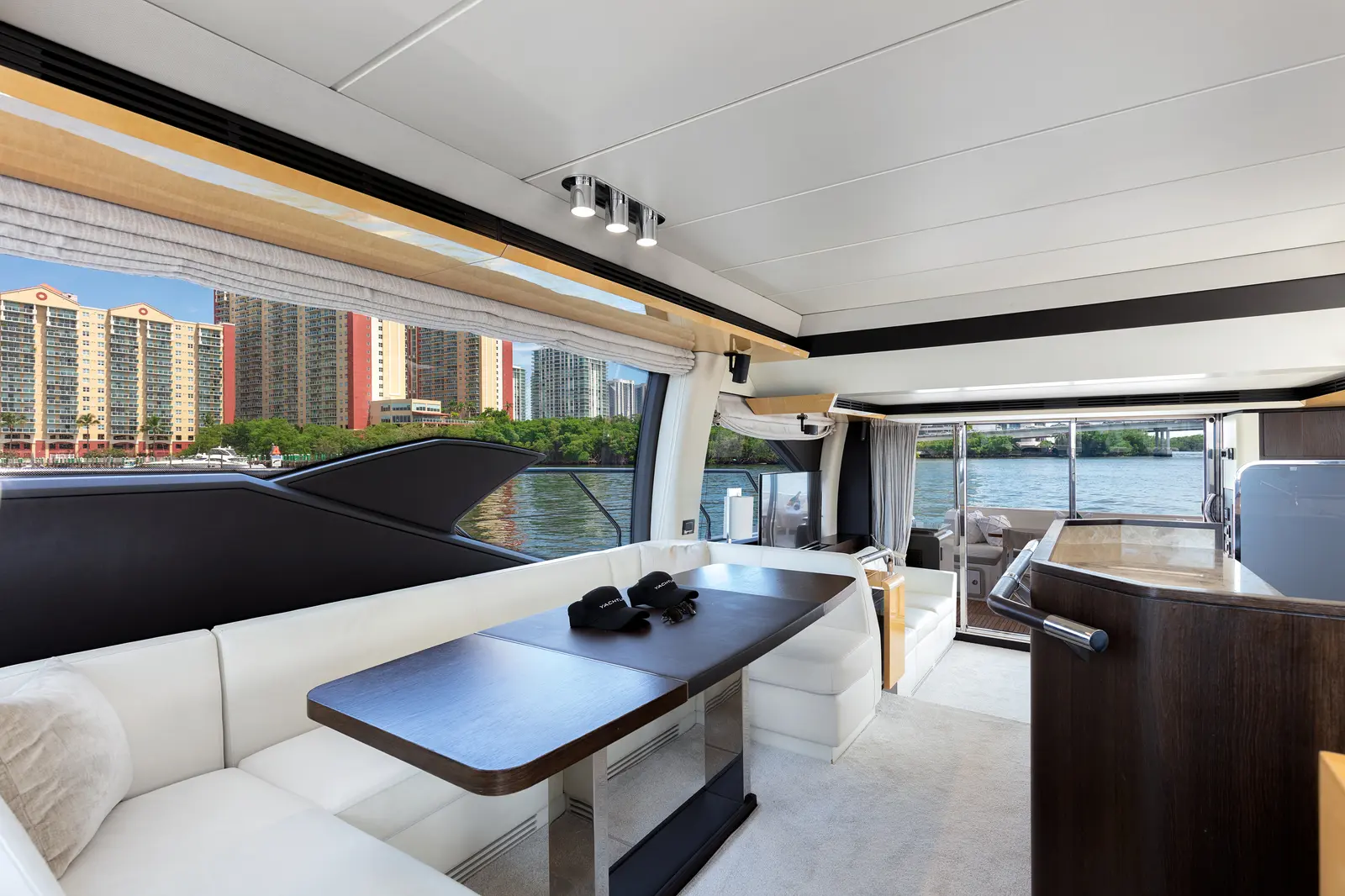 Azimut 68 "Le Grand Bleu" salon dining table by the windows