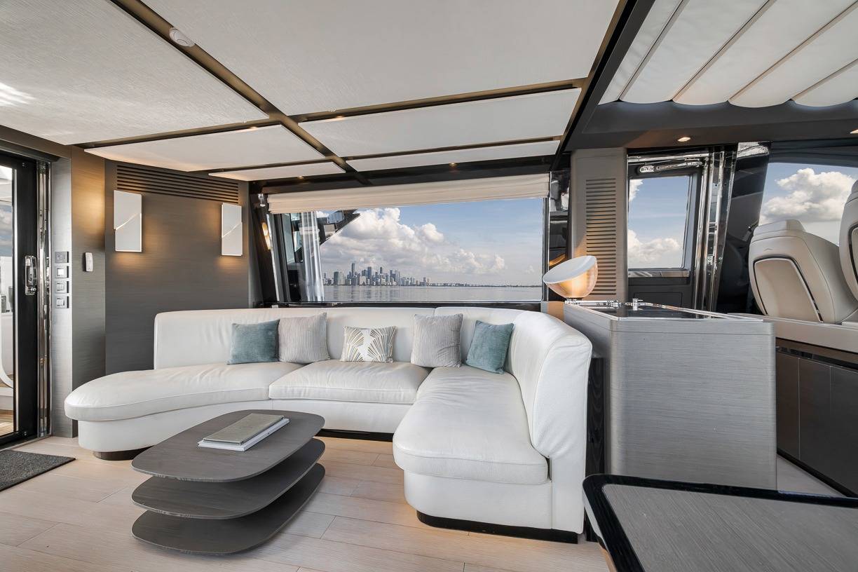 The lounge on board, with the Miami skyline through the windows