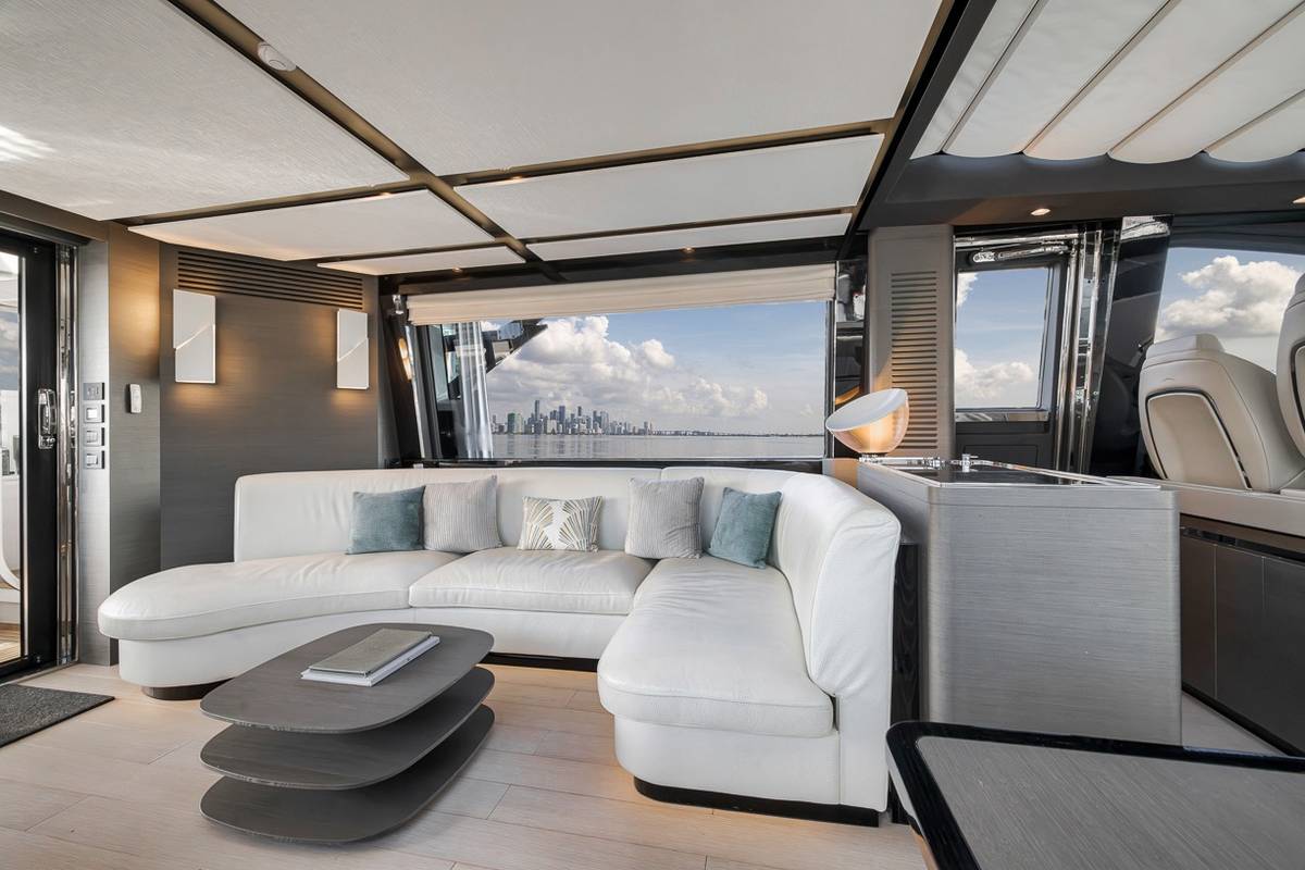 The lounge on board, with the Miami skyline through the windows